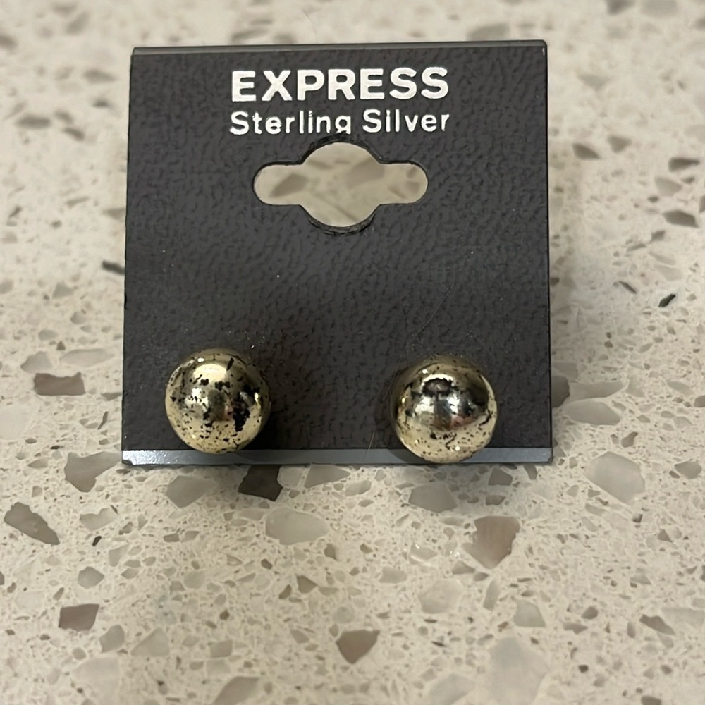 Express sterling silver earrings never worn